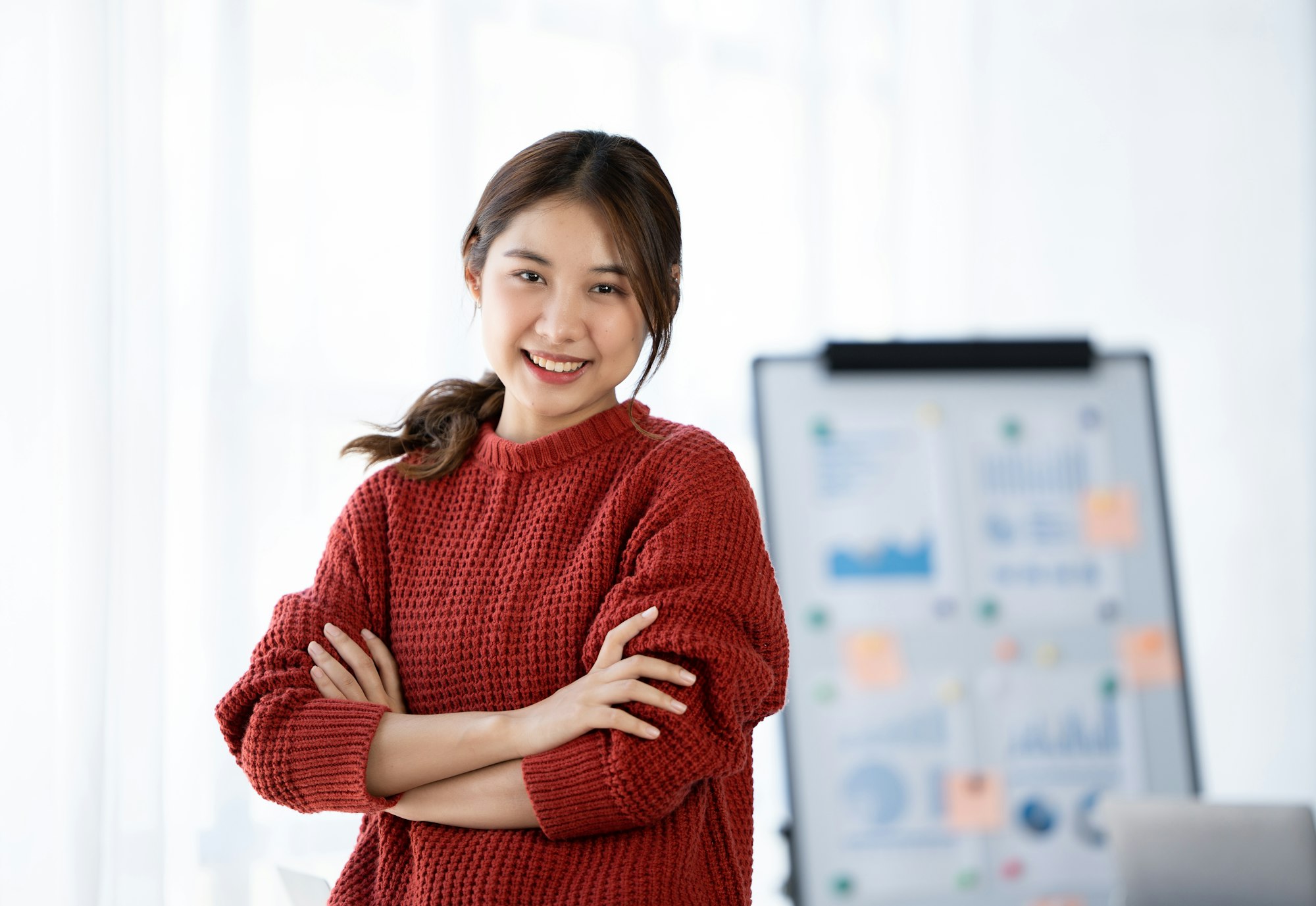 Young confident smiling Asian business woman leader, successful entrepreneur
